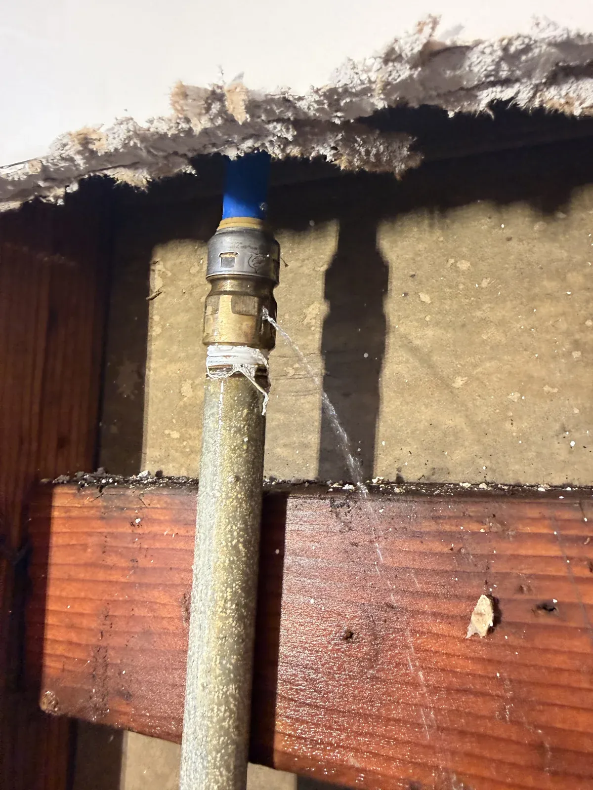 Water leaking at the transition fitting before repair