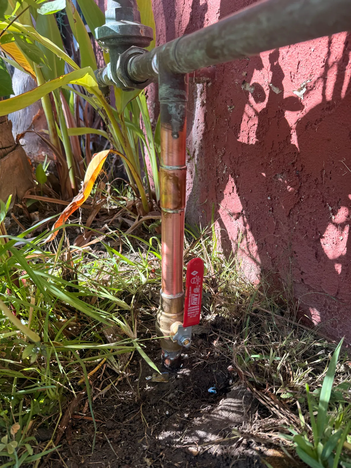 The new one-inch main ball valve on the copper supply to the house
